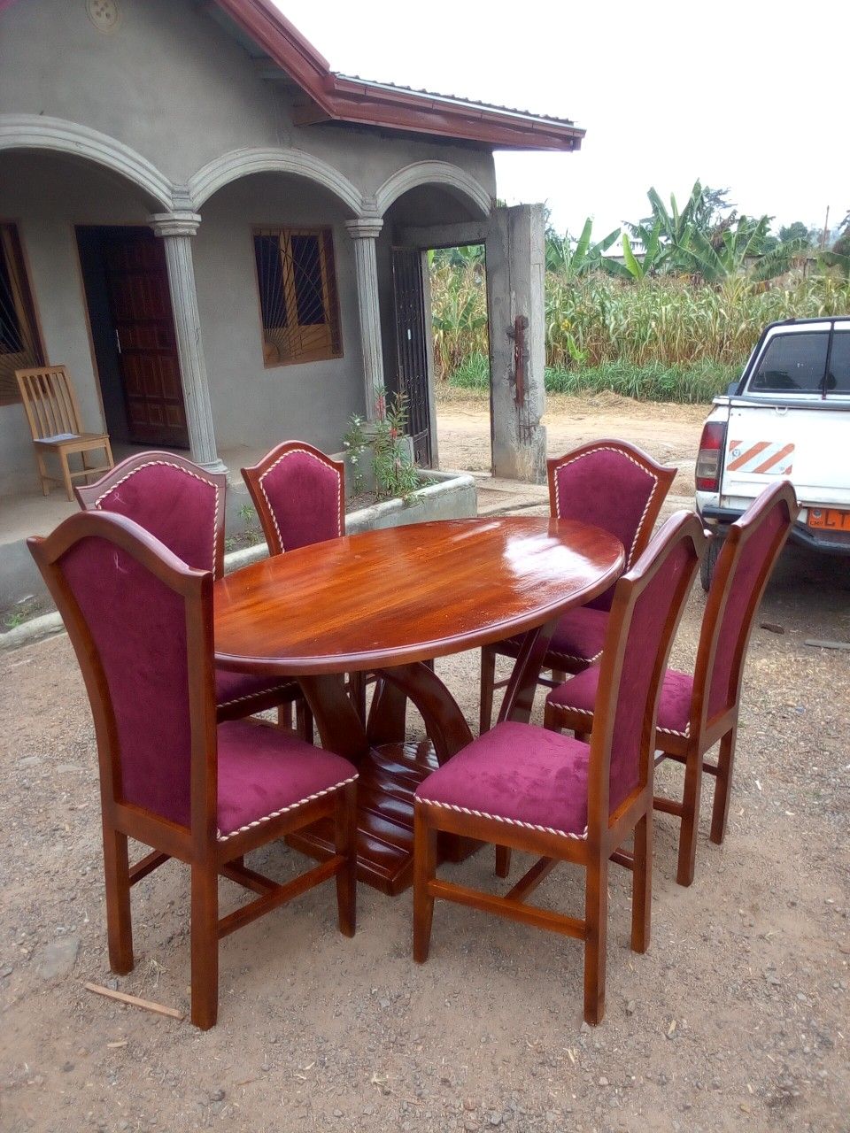 Round Dining Set with Upholstered Chairs